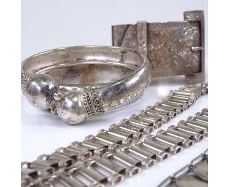 Various 19th century silver and unmarked white metal jewellery, including large hinged buckle bangle, etruscan torque bangles