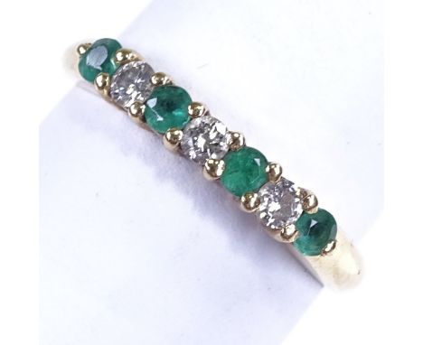 A modern 18ct gold 7 stone emerald and diamond dress ring, total diamond content approx 0.15ct, setting height 3mm, size M, 3