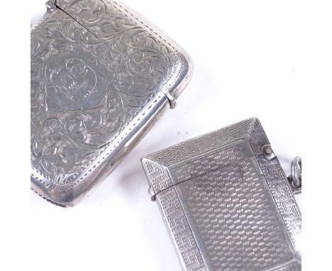 A large George V silver Vesta case, allover engraved foliate decoration, by John Rose, hallmarks Birmingham 1912, and an engi