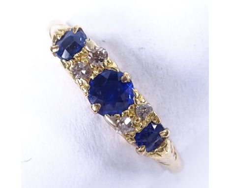 A 19th century 18ct gold 7 stone sapphire and diamond half hoop ring, total diamond content approx 0.5ct, setting height 4.4m