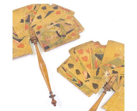2 early 19th century playing card design face screens/fans, with printed screens and boxwood handles, length 29cmThe screens 
