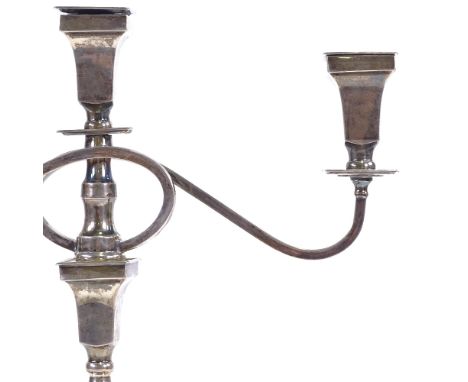 A George V silver 3-light candelabra, square tapered form with beaded edge, scrolled arms, removable sconces, and converting 