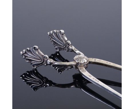 GEORG JENSEN - a pair of Danish sterling silver Dronning pattern sugar tongs, acanthus decoration with sprung centre, length 