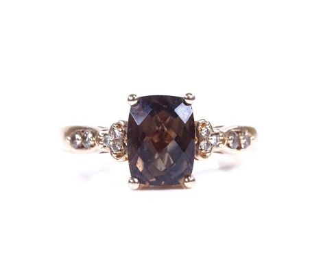 A modern 14ct rose gold smoky quartz and diamond dress ring, setting height 8.5mm, size K, 3.2gVery good original condition, 