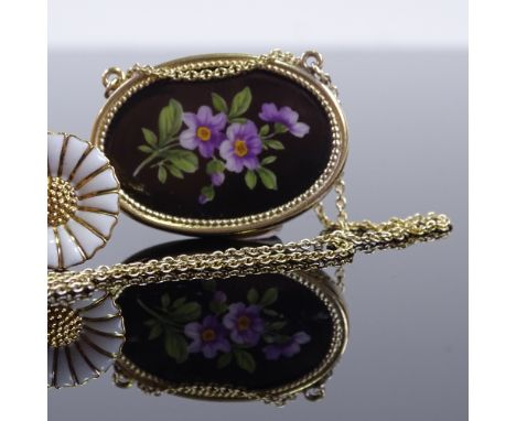 A Georg Jensen Danish vermeil sterling silver white enamel daisy shoe lace slide, and a Royal Copenhagen Danish sterling flor