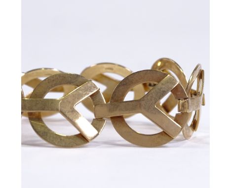 A mid-20th century 9ct gold panel bracelet, hallmarks Birmingham 1957, bracelet length 16.5cm, 17.7gGood original condition, 