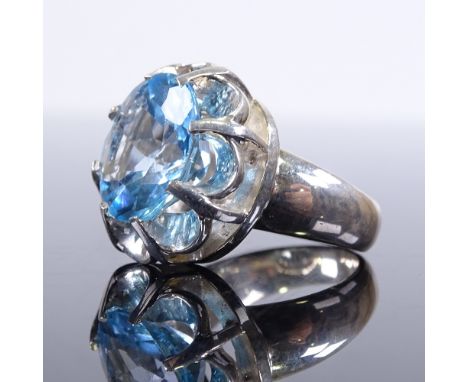 A large modern handmade sterling silver and blue topaz dress ring, setting height 20.9mm, size P/Q, 17.5gGood original condit