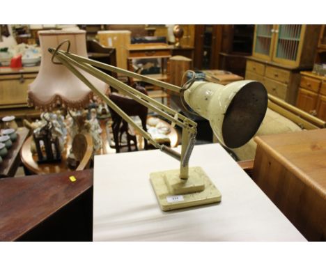 An angle poise lamp