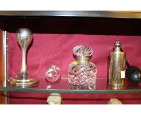 A Danish plated candlestick together with a heavy glass inkwell; a glass engraved egg and a perfume atomiser