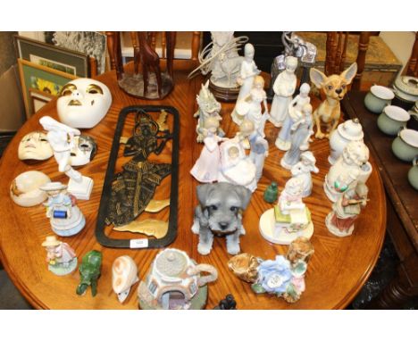 A collection of various china ornaments; a table lamp and shade; a carved animal figure group etc.