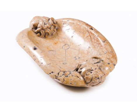 A holy water basin  Limestone Decorated with two lion heads and Saint Peter's keys Portugal (small defects)  12x47x32 cm  