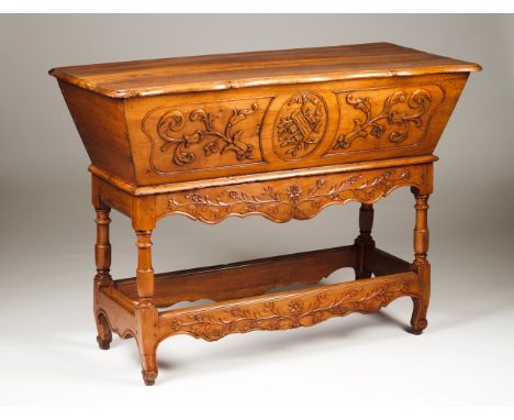 A bread trough  Walnut with carved decoration France, 18th century  92x126x56 cm  