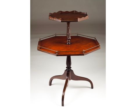 A Dumbwaiter  Mahogany Central column on tripod foot One shelf with gallery England, 19th century  93x65 cm  