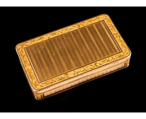 An Empire snuff box  18kt gold with chased floral decoration and guilloché panels French assay and guarantee marks (1809-1819
