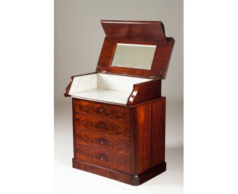 A small Victorian commode  Mahogany With four drawers Top opens to reveal a mirror and marble interior England, 19th century 