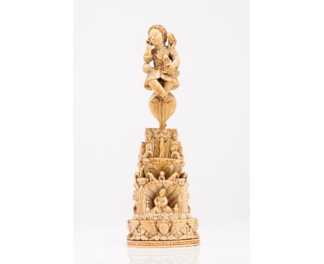 Child Jesus as the Good Shepherd  A large ivory Indo-Portuguese sculpture The Child is sleeping above a heart and  wearing a 