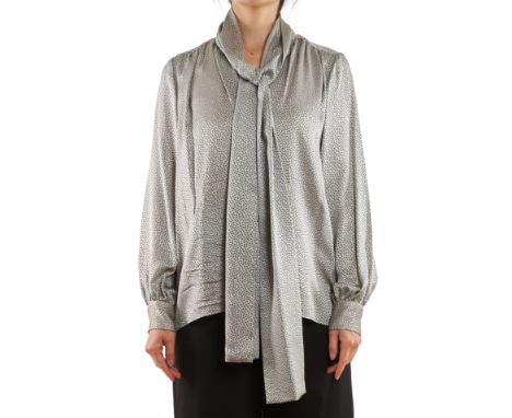 NO RESERVE SAINT LAURENT SILK POLKA DOT BLOUSECondition grade B-.Size 38. 112cm chest, 76cm length. Circa 1970's. Grey polka 