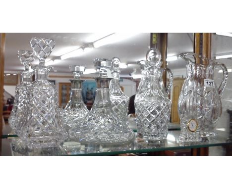 Silver mounted ships decanter, 2 further decanters, large glass jug & clock
