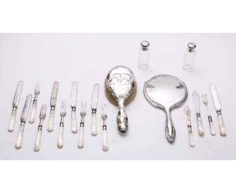 A mixed group of silver and silver plate including; a Birmingham silver long handle mirror, a London silver long handle hair 