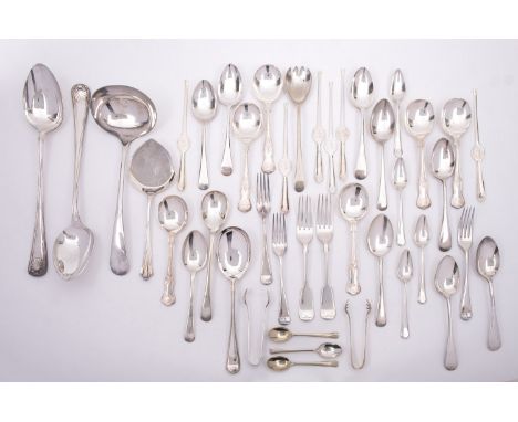 A mixed group of silver plated flatware including; two basting spoons, a soup ladle, a set of eight King's pattern soup spoon