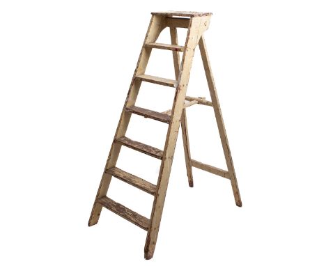 Wooden step ladder.