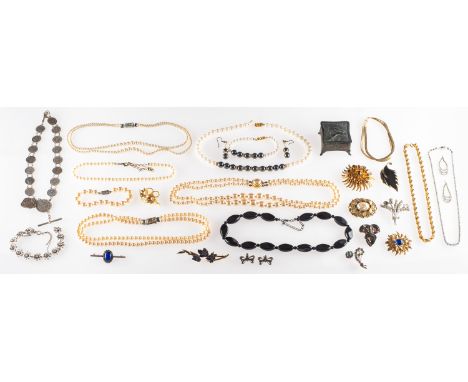 A mixed group of costume jewellery, including faux pearl necklaces, bracelets and a pair of drop earrings; brooches some set 