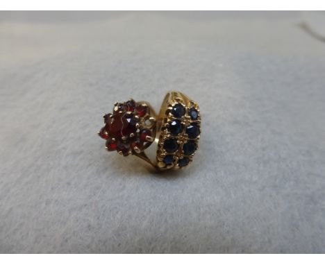 An 9ct gold eight stone sapphire dress ring, size K, and a 9ct gold and garnet cluster ring, size L/M.