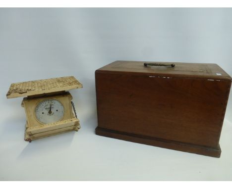 A cased Frister and Rossman sewing machine, and a set of Jaraso luggage scales.