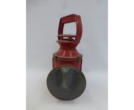 A red railway lamp.