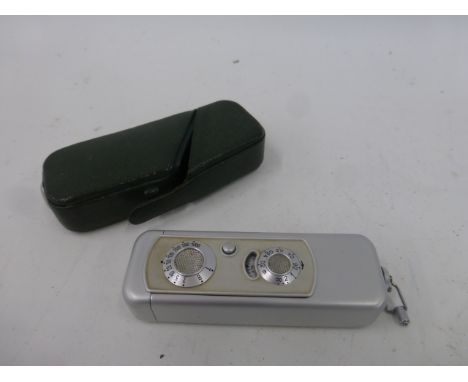 A leather cased Minox WETZLAR miniature pocket camera, complan 1:3,5 F=15mm.