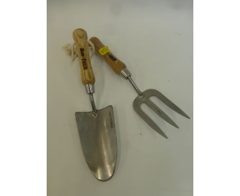 An Am Tech stainless steel hand trowel and fork set.