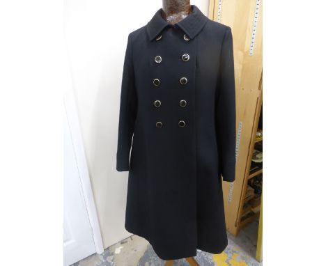 A good, double breasted ladies French all wool coat with detailed rowed stitching to collar, fully lined, interesting buttons