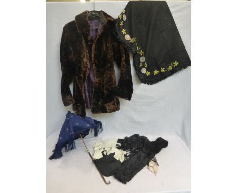 A good quality silk-lined fur coat/jacket and selection of clothing and accessories including a fur, sleeves, a parasol, trim