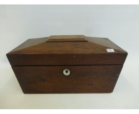 A 19th Century rosewood tea caddy with two internal lidded canisters and central glass bowl, with mother of pearl escutcheons