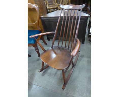 An Ercol Golden Dawn elm and beech Goldsmith rocking chair 