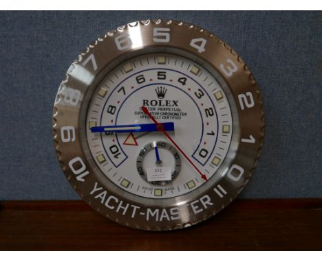 A Rolex style dealer's display wall clock 
