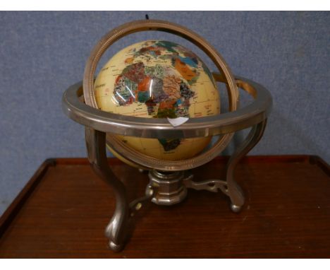 A faux gemstone desk top terrestrial globe on stand 