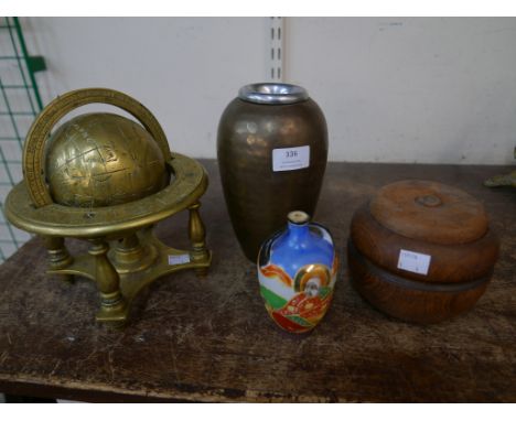 A small brass terrestrial globe on stand, a treen pot and cover and two others 