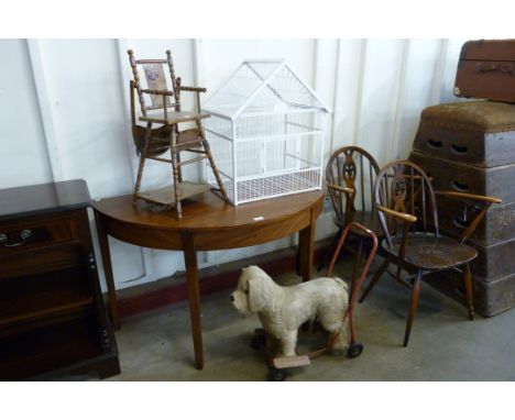 A pair of Ercol fleur de lys dining chairs, a George III mahogany demi-lune hall table, painted bird cage, etc. 