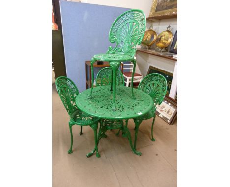 A painted cast alloy garden table and four chairs, one chair a/f 