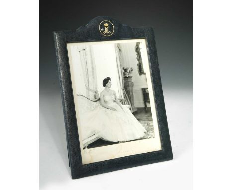 BEATON (Cecil) Portrait photograph of HRH Princess Margaret, signed by her and Beaton to the mount below, dated 1956, in a bl