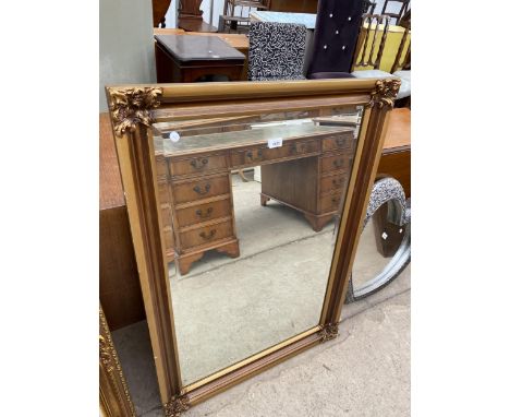 A MODERN GILT FRAMED WALL MIRROR, 41X29" 