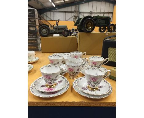 A ROYAL STANDARD 'ROSE MAXI' TEASET TO INCLUDE A CAKE PLATE, CREAM JUG, SUGAR BOWL, FIVE CUPS, SAUCERS AND SIDE PLATES 