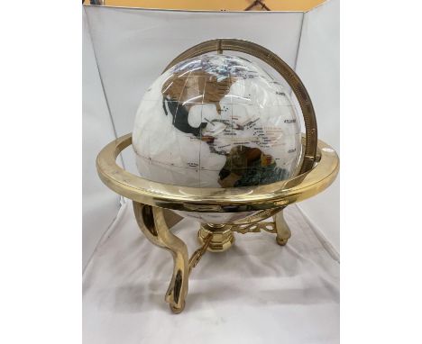 A GLOBE WITH MOTHER OF PEARL INLAYS ON BRASS ROTATING STAND H: 51CM 