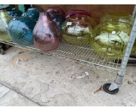 A LARGE ASSORTMENT OF TRANSLUCENT COLOURED GLASS LIGHT SHADES 