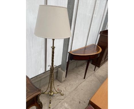 AN ART NOUVEAU INFLUENCE BRASS ADJUSTABLE STANDARD LAMP, CONVERTED TO ELECTICITY 