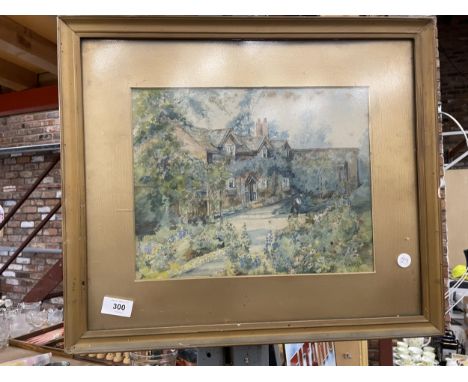 A VINTAGE FRAMED PRINT OF A COTTAGE AND GARDEN 