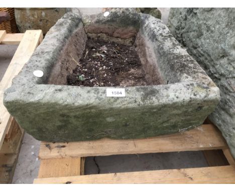 A GRADUATED SNADSTONE TROUGH (L:44CM WIDTH AT NARROWEST:32CM WIDTH AT WIDEST:43CM) 
