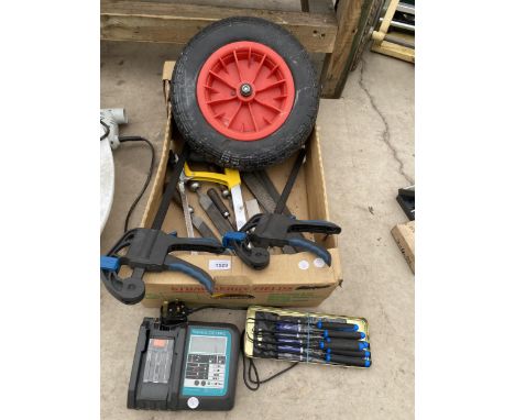 AN ASSORTMENT OF TOOLS TO INCLUDE A BATTERY CHARGER, FILES AND CLAMPS ETC 