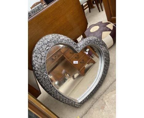 A MODERN SILVER COLOURED HEART SHAPED WALL MIRROR 